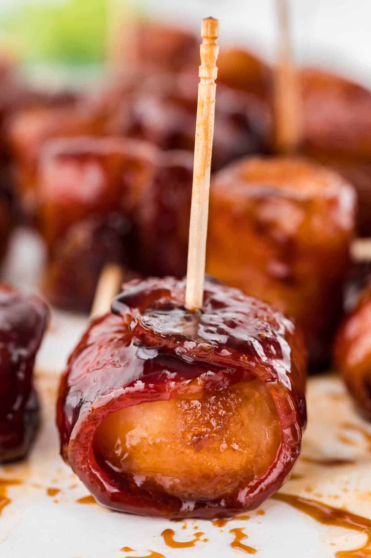 Bacon wrapped water chestnut with a toothpick.