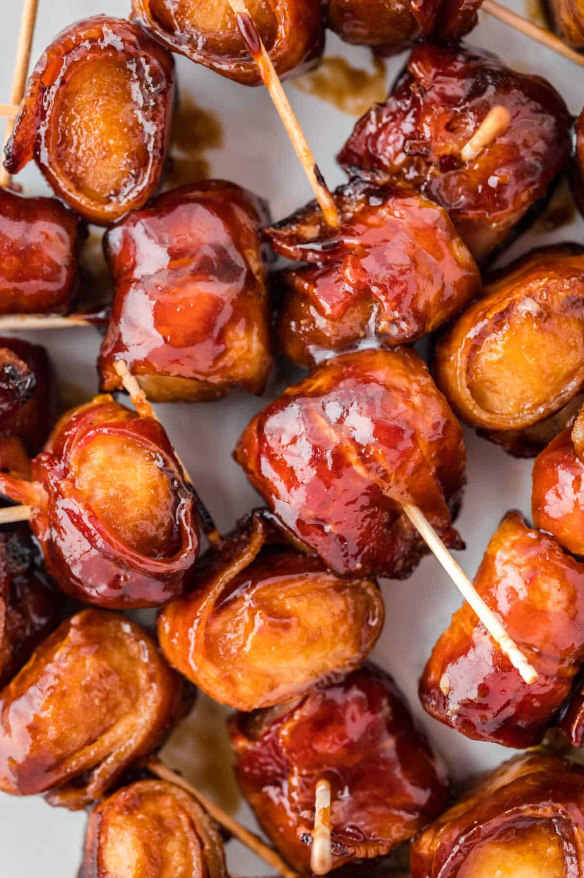 A group of bacon wrapped water chestnuts.