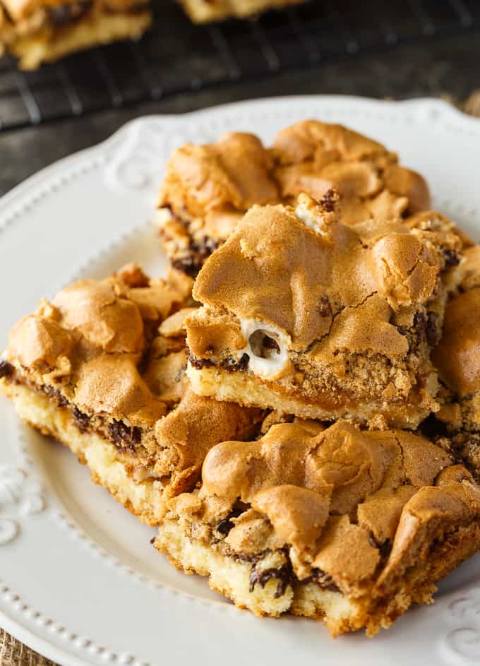 Mud Hen Bars - A vintage dessert from Grandma's cookbook. It has a cookie bar base, topped with a rich layer of walnuts, chocolate and melted marshmallows followed by a sweet brown sugar meringue topping.