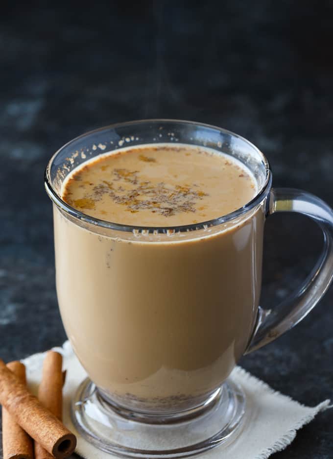 Slow Cooker Chai Latte - Sweet and spicy! This cozy drink is perfect for cold nights curled up with a good book.