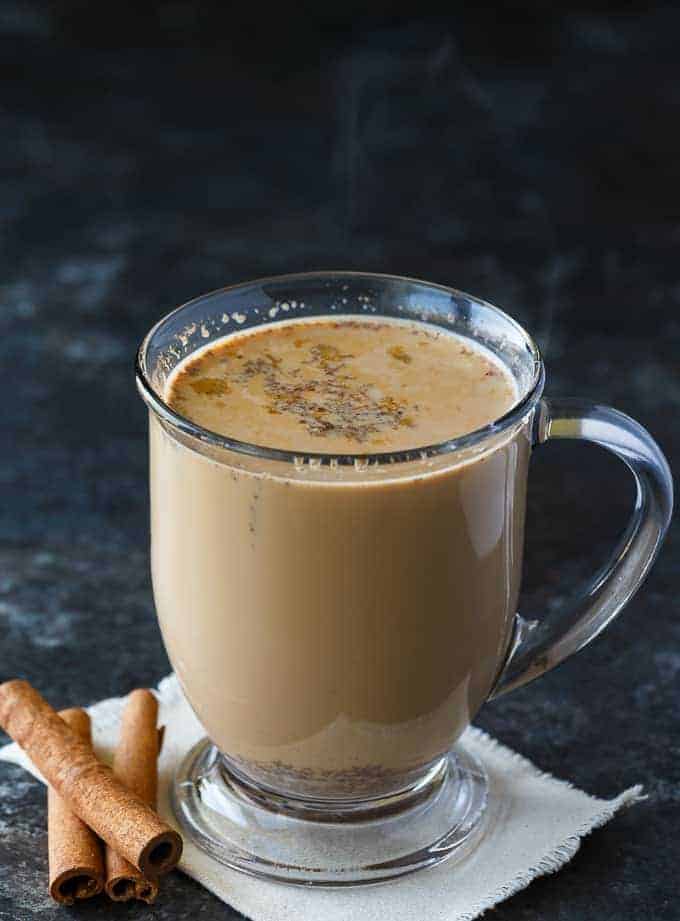 Slow Cooker Chai Latte - Sweet and spicy! This cozy drink is perfect for cold nights curled up with a good book.
