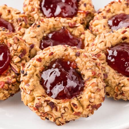 Thumbprint cookies on a plate.