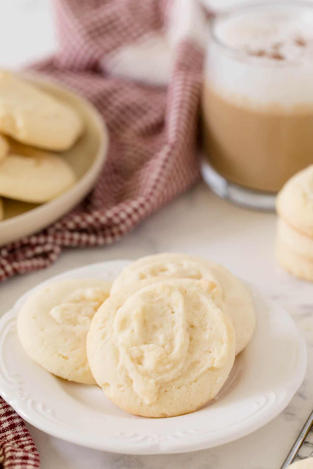 3 whipped shortbread cookies on a plate
