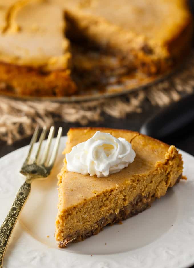 Keto Pumpkin Cheesecake - Rich and creamy! Enjoy this easy keto dessert guilt-free. Each bite is pure pumpkin heaven.