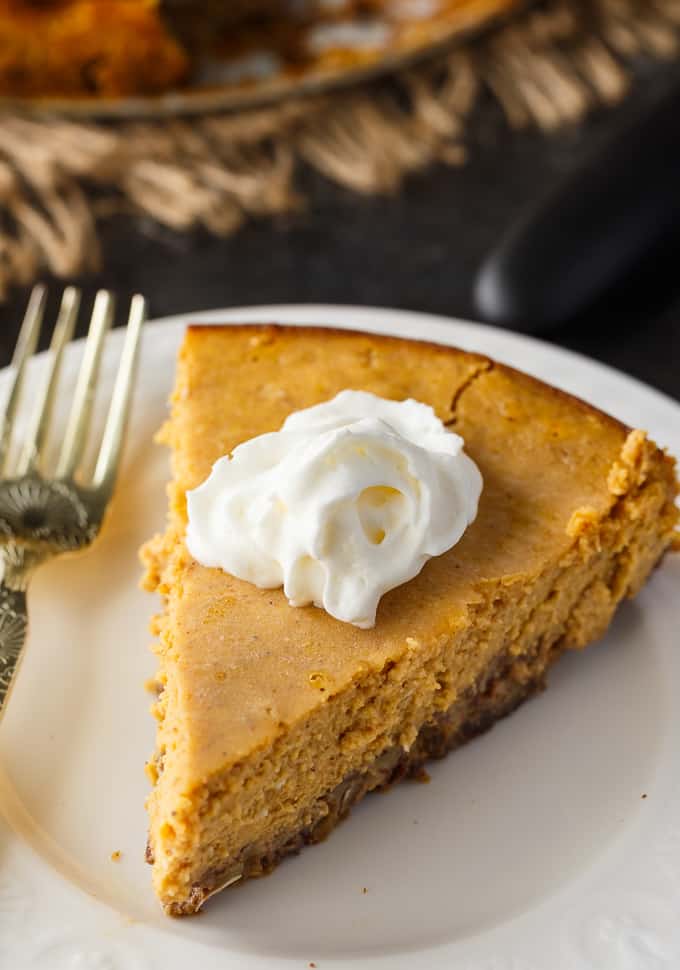 Keto Pumpkin Cheesecake - Rich and creamy! Enjoy this easy keto dessert guilt-free. Each bite is pure pumpkin heaven.