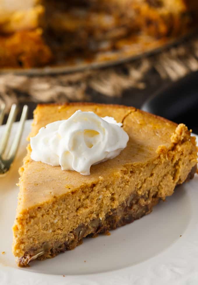 Keto Pumpkin Cheesecake - Rich and creamy! Enjoy this easy keto dessert guilt-free. Each bite is pure pumpkin heaven.