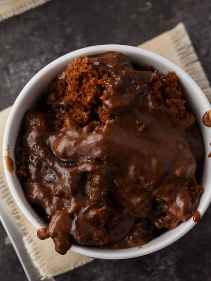 Hot Fudge Pudding Cake - So sinfully rich! Luscious chocolate cake bakes right with a creamy, chocolatey pudding sauce.