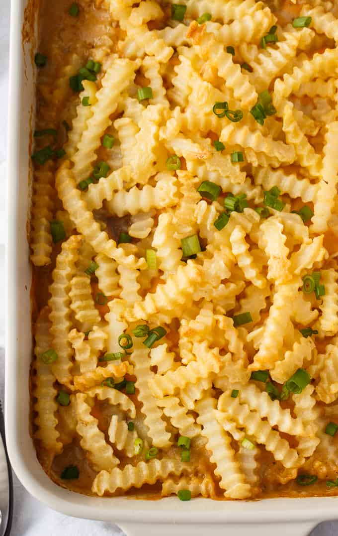 French Fry Casserole - This is the ultimate kid-friendly meal! Ground beef, creamy mushroom cheddar sauce and French Fries are a surefire way to get your kids to the table. 