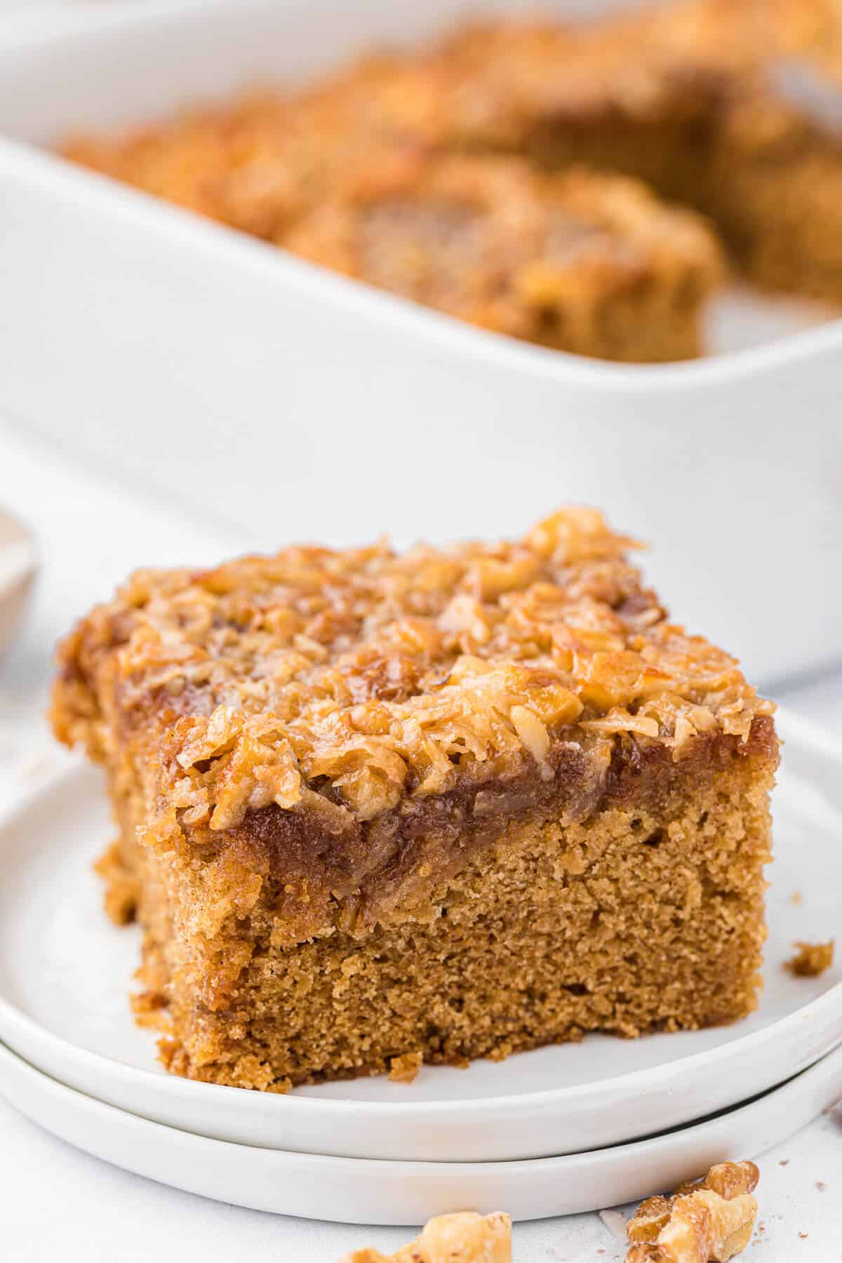 A slice of oatmeal cake on a plate.