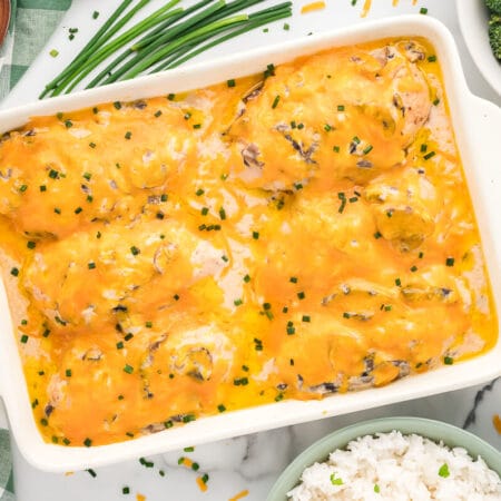 Sour cream chicken bake in a white casserole dish.