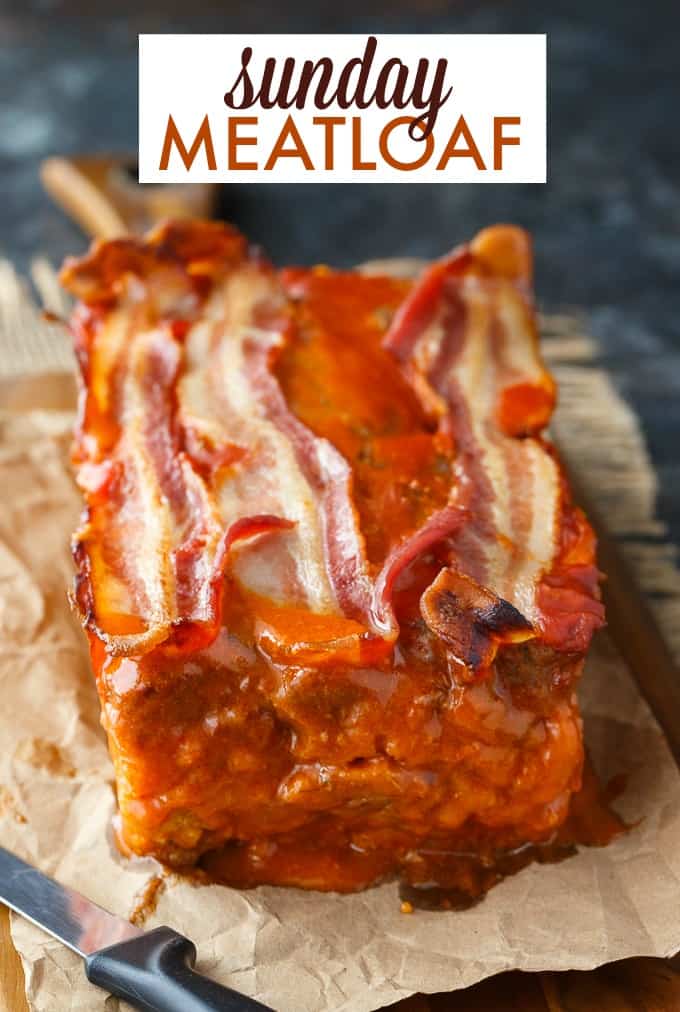 Sunday Meatloaf - A delicious family recipe! This easy meatloaf has a flavorful stuffing filling and is topped with a mouthwatering tomato sauce and bacon.
