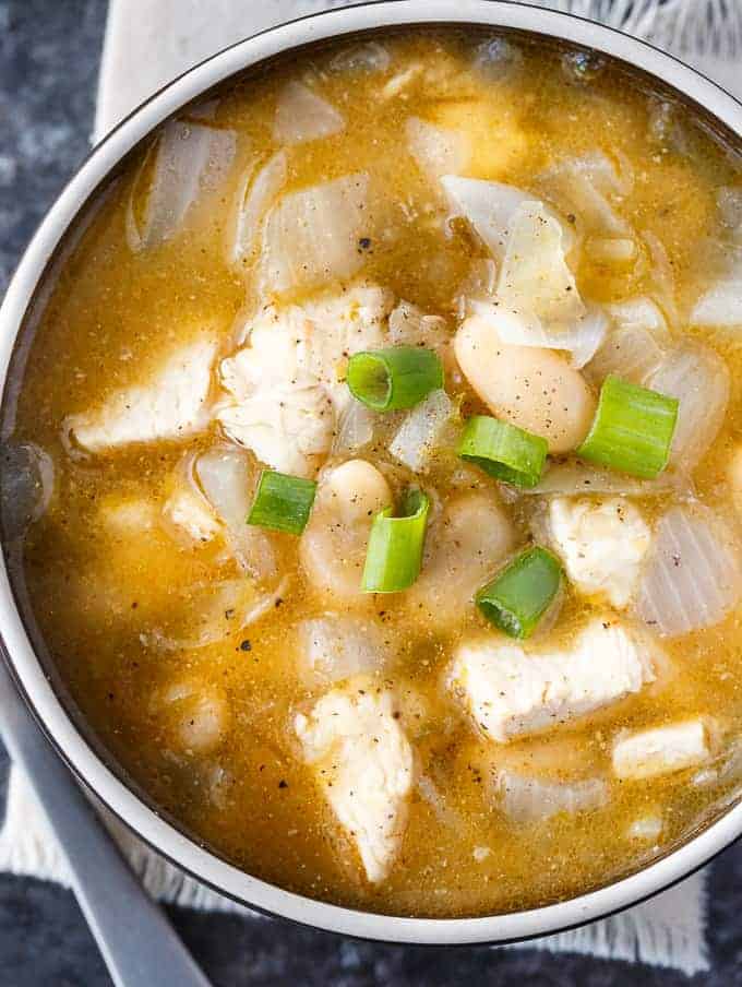 White Chicken Chili - Healthy and delicious! This simple white chili recipe is filled with tender morsels of chicken, white kidney beans and spices.