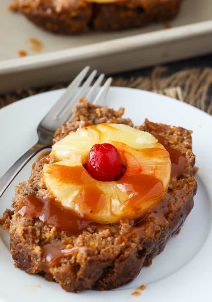 Caribbean Meatloaf - Comfort food recipe with a twist! Top this traditional ground beef and pork dish with pineapples and sweet cherries.