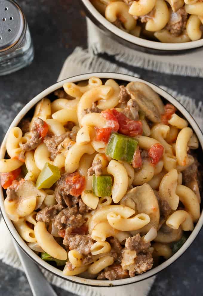 Mom's Macaroni -  A comforting stove top casserole made with tender macaroni noodles, ground beef, tomatoes, mushrooms and cheese. It's like a hug from mom, but in a bowl!