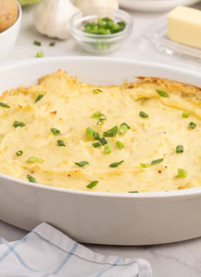 The recipe in a white serving dish.