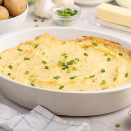 The recipe in a white serving dish.