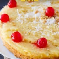 Fool's Cake - A simple, fool-proof cake everyone loves! This yummy dessert has layers of walnuts, yellow cake, coconut and pineapple. Perfect for potlucks!