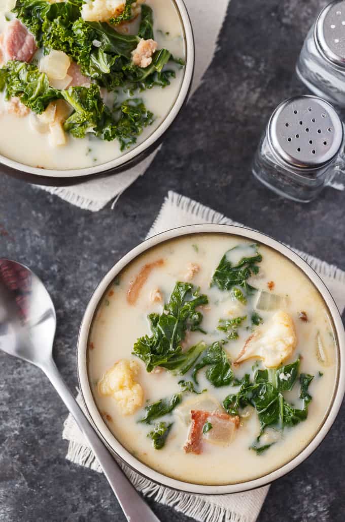 Keto Zuppa Toscana - A keto friendly version of the famous Tuscan soup! It's filled with kale, bacon, sausage, roasted cauliflower immersed in a creamy broth.