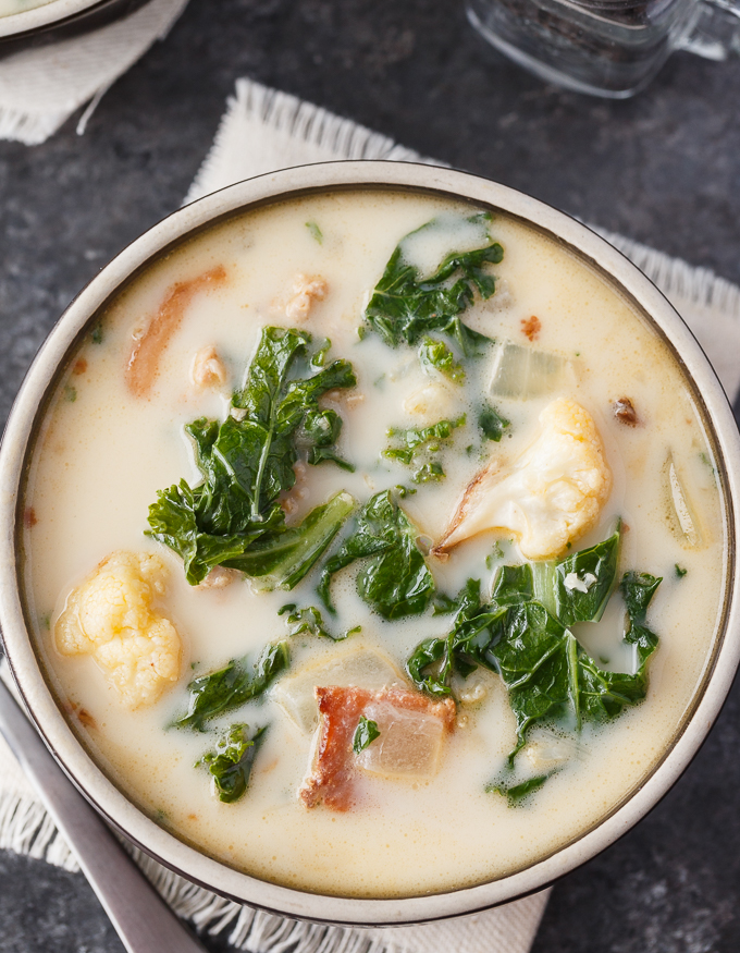 Keto Zuppa Toscana - A keto friendly version of the famous Tuscan soup! It's filled with kale, bacon, sausage, roasted cauliflower immersed in a creamy broth.