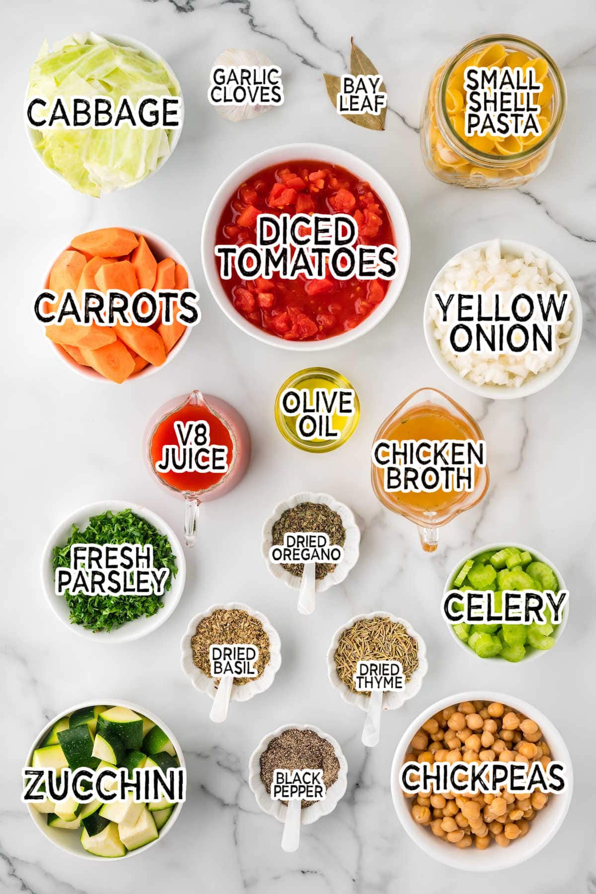 Ingredients on a white marble counter.