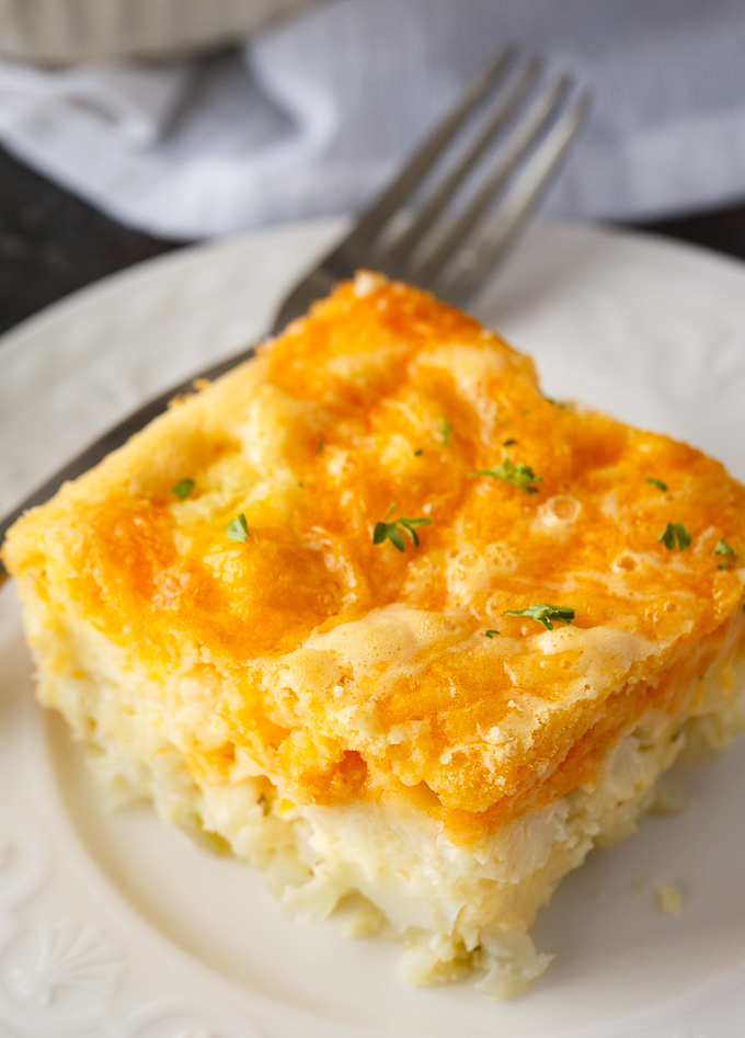 Cauliflower Bake - Cauliflower, cheese and a convenient biscuit mix make a fantastic side dish. Even those that don't love cauliflower will love this one!