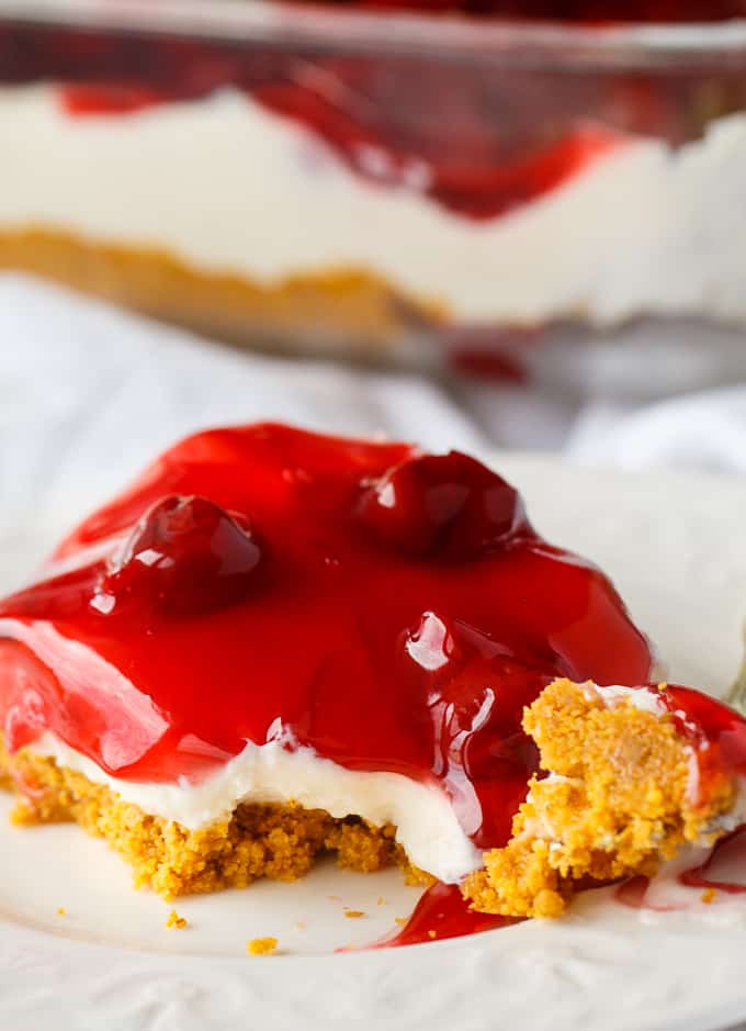 No-Bake Cherry Cheesecake - Deliciously simple no-bake cheesecake that can be whipped up in a matter of minutes! You'll love the sweet graham cracker crumb crust, creamy cheesecake filling and fruity topping.