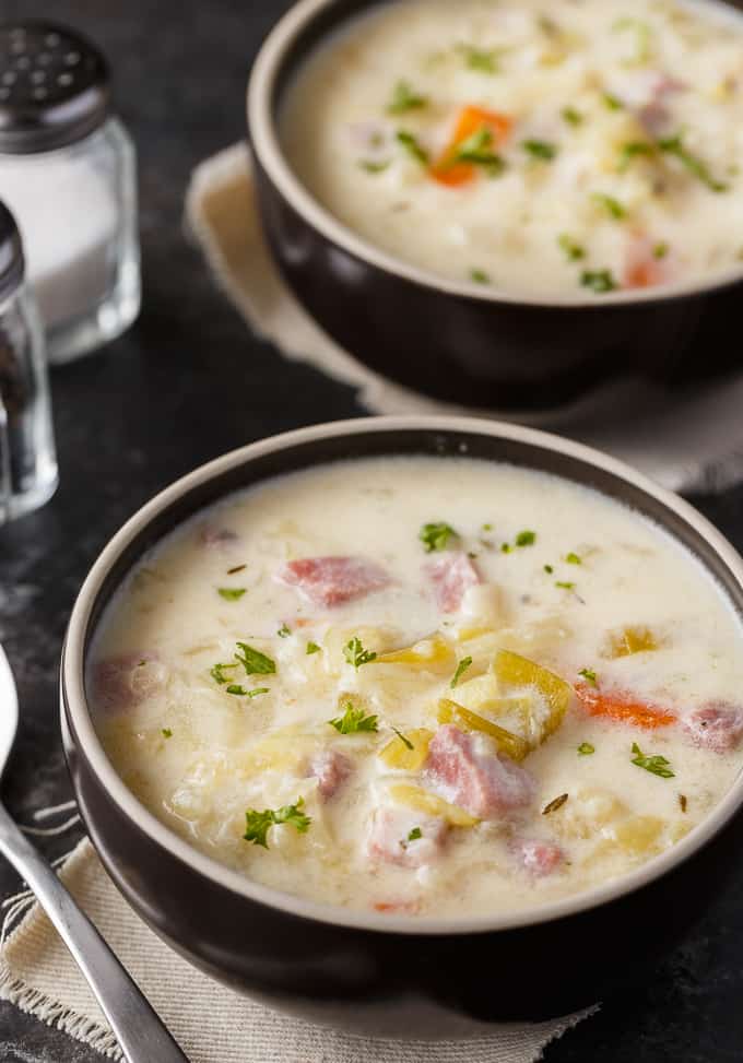 Creamy Cabbage Soup - Hearty and comforting! This delicious and easy soup recipe is loaded with tender cabbage, carrots, celery, ham and spices. Yum!