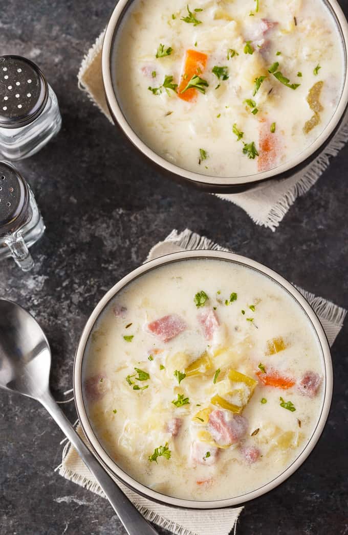 Creamy Cabbage Soup - Hearty and comforting! This delicious and easy soup recipe is loaded with tender cabbage, carrots, celery, ham and spices. Yum!