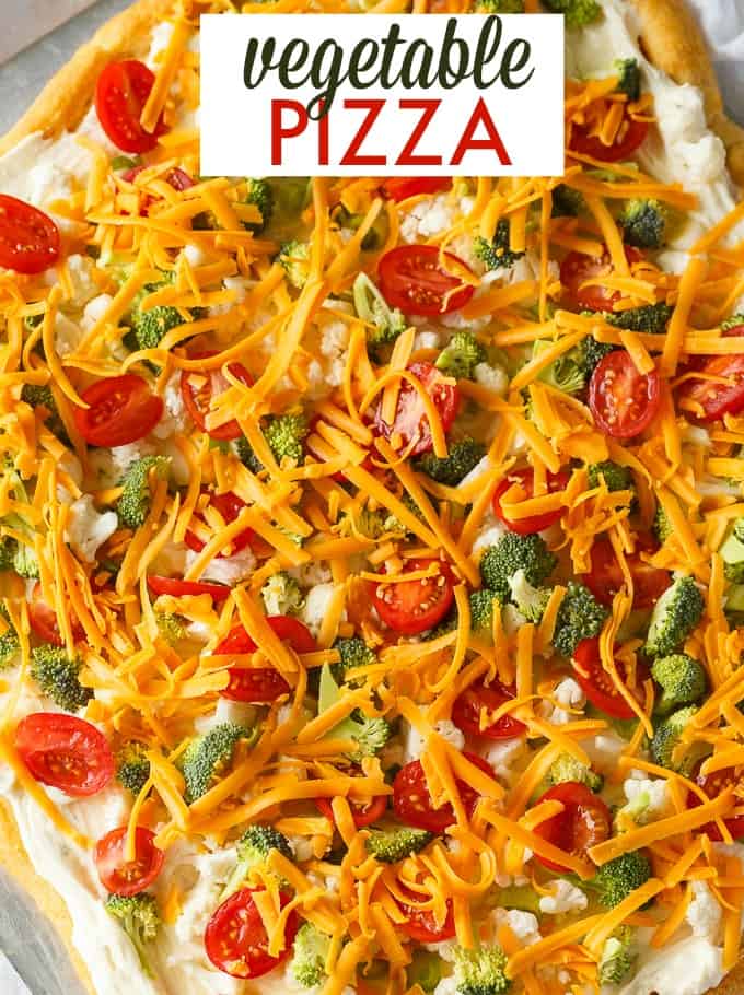 Vegetable Pizza - This easy appetizer is perfect for parties and potlucks. It's made with crescent roll dough, ranch dressing mix and loads of fresh, crispy veggies. Yum!