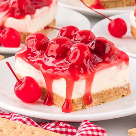 A slice of cheesecake on a plate.