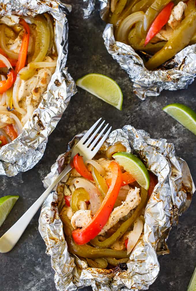 Chicken Fajita Foil Packets - Flavor packed and low carb! This easy grilling recipe is made with tender chicken, peppers and onions seasoned with the yummy tastes of fajitas.