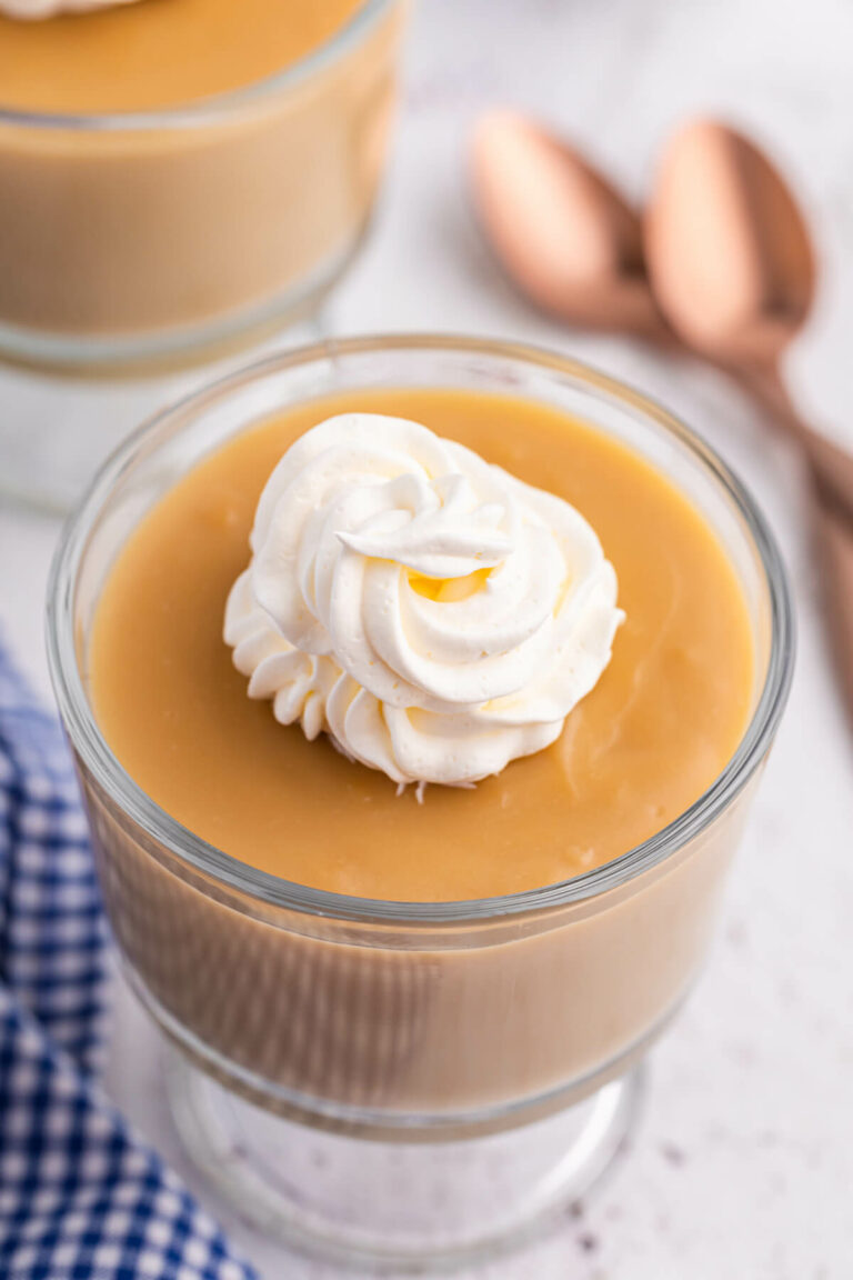 A parfait dish of butterscotch pudding.