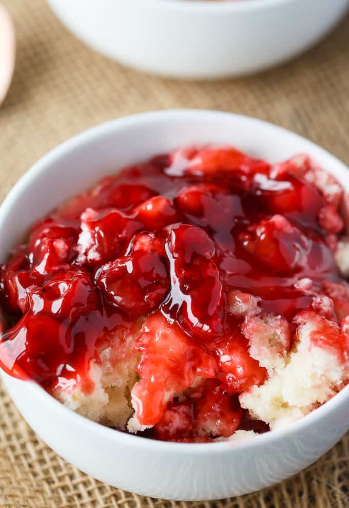 Cherry Pudding Cake - Think Sauce n Cake only better! Sweet cherry pie filling bakes with a sweet cake. This easy dessert tastes even better than it looks!