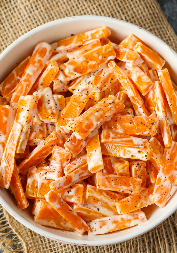 Creamy Carrots - A vibrant and bright holiday side dish recipe! Your kids will love these carrots with just sugar, salt, mayo, and cream.