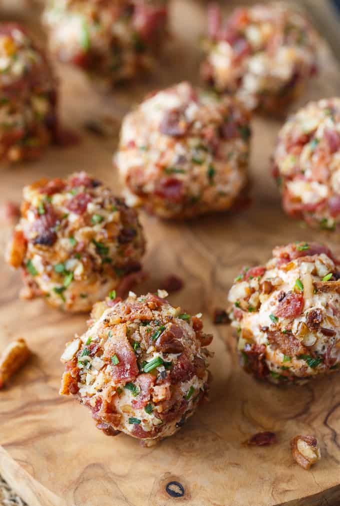 Keto Cheese Balls - Bite sized cheese balls make a delicious low carb appetizer! Flavorful cream cheese balls are rolled in a mixture of bacon, chives and pecans.