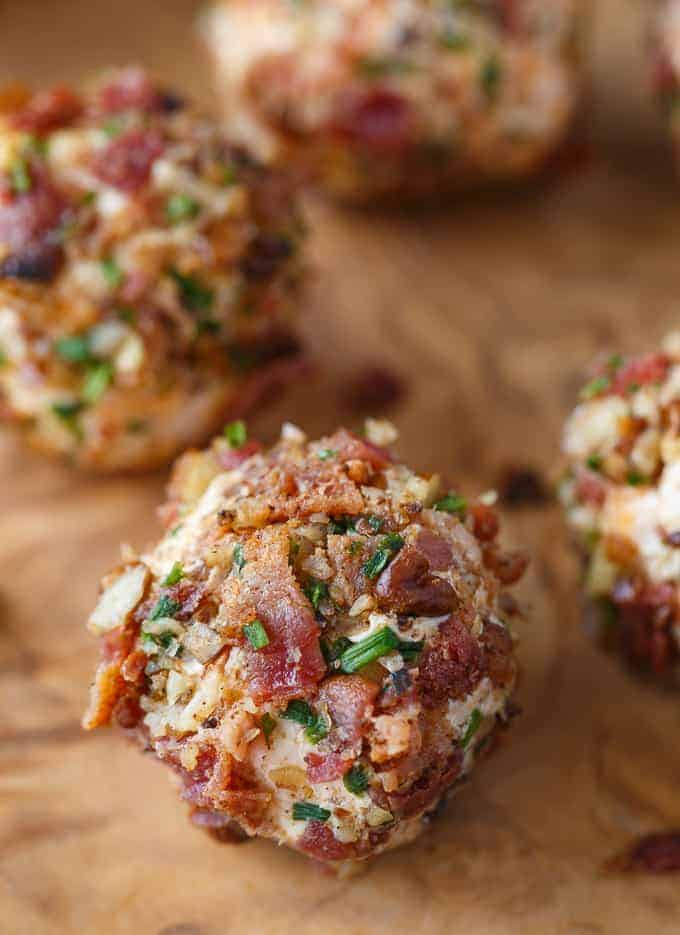 Keto Cheese Balls - Bite sized cheese balls make a delicious low carb appetizer! Flavorful cream cheese balls are rolled in a mixture of bacon, chives and pecans.