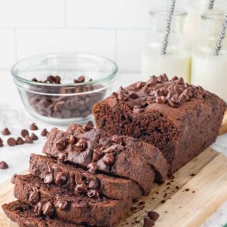 A loaf of chocolate zucchini bread cut into slices.