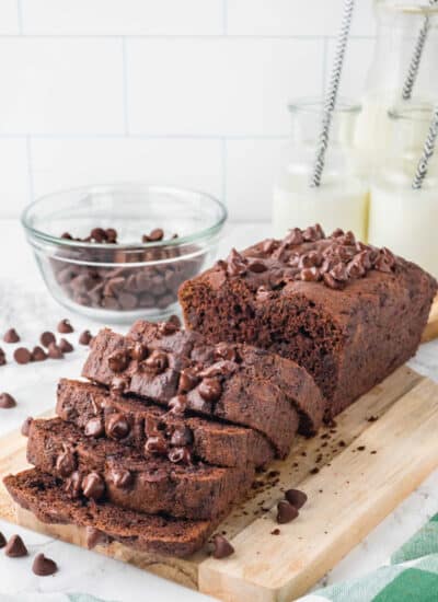 A loaf of chocolate zucchini bread cut into slices.