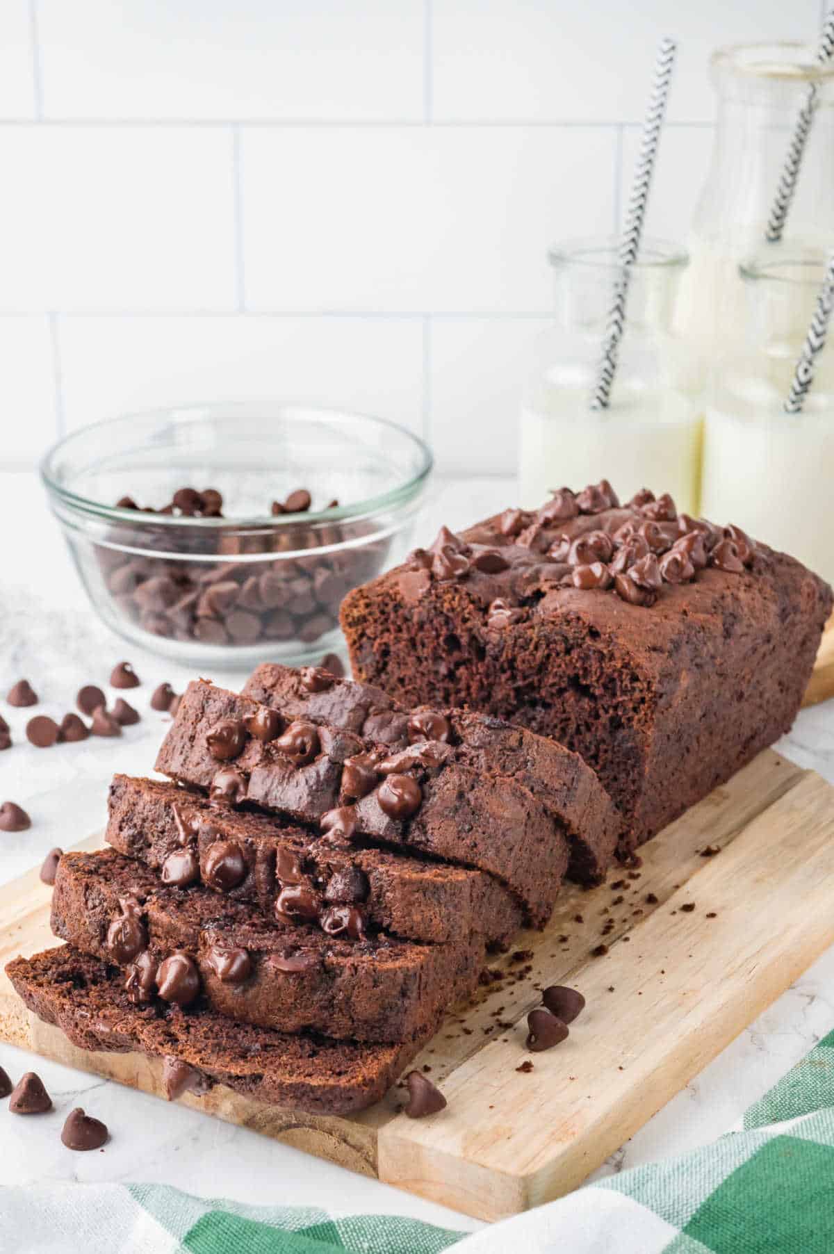 A loaf of chocolate zucchini bread cut into slices.