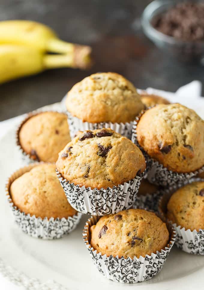 Banana Chocolate Chip Muffins - The perfect way to use up your brown bananas! This easy muffin recipe is incredibly moist and perfectly sweet.