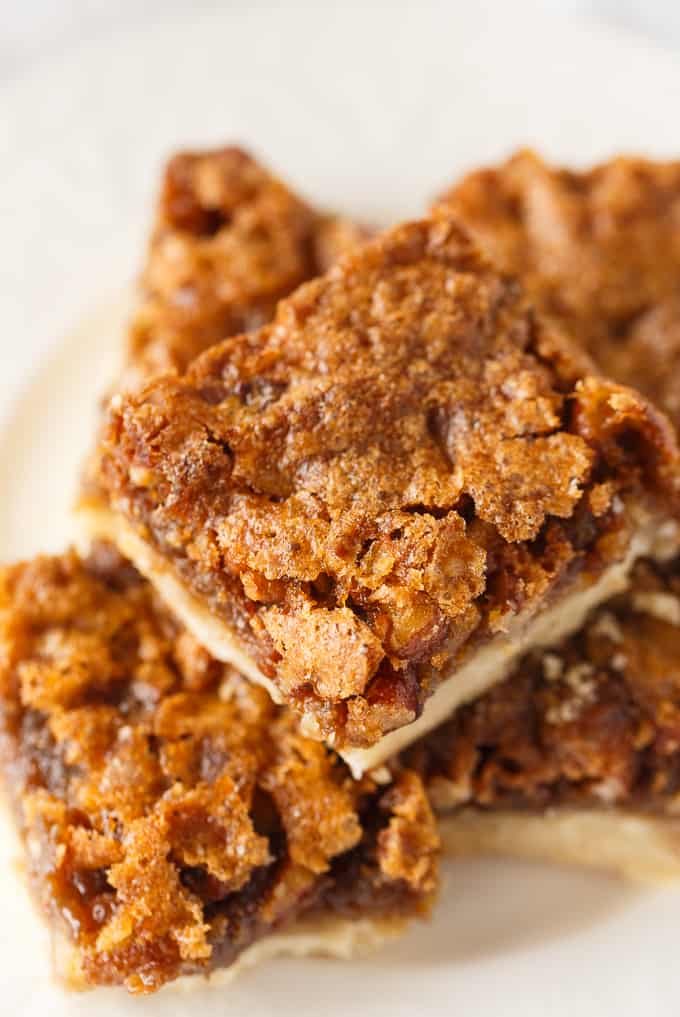 Butter Tart Squares - Canada's BEST dessert! Gooey butter tart filling packed with pecans on a sweet buttery crust.