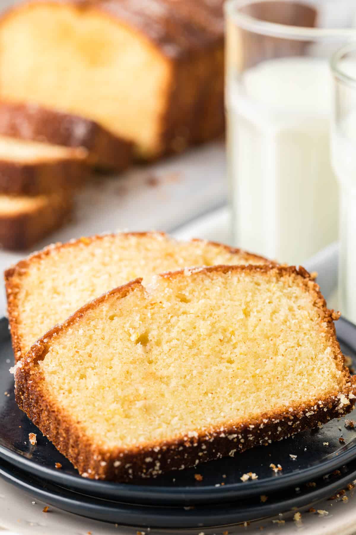 Two slices of lemon bread on a plate.