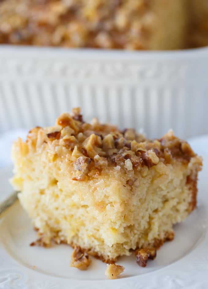 Pineapple Cake - Incredibly moist cake with a hint of sweet pineapple taste. The topping is the BEST part with its buttery, nutty goodness.