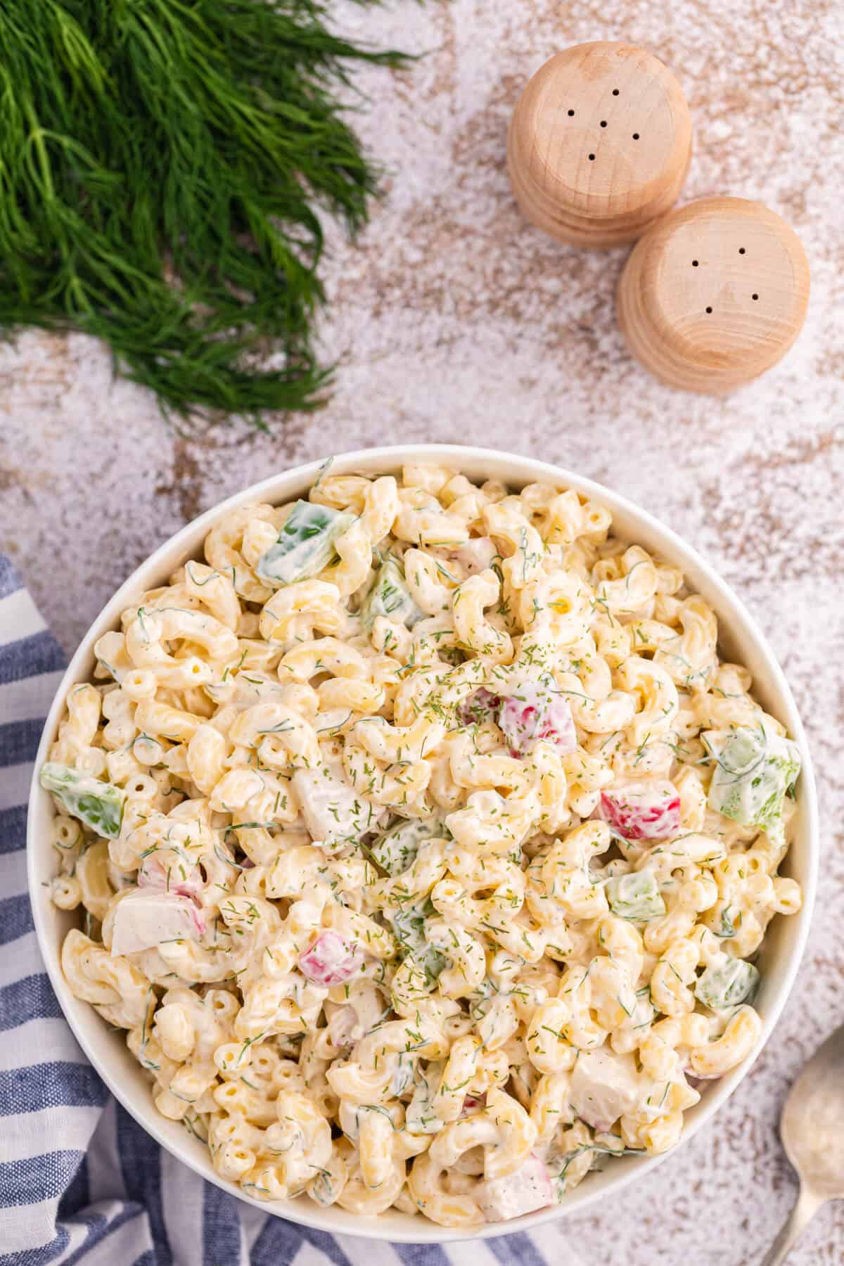 Macaroni Dill Salad in a white bowl.