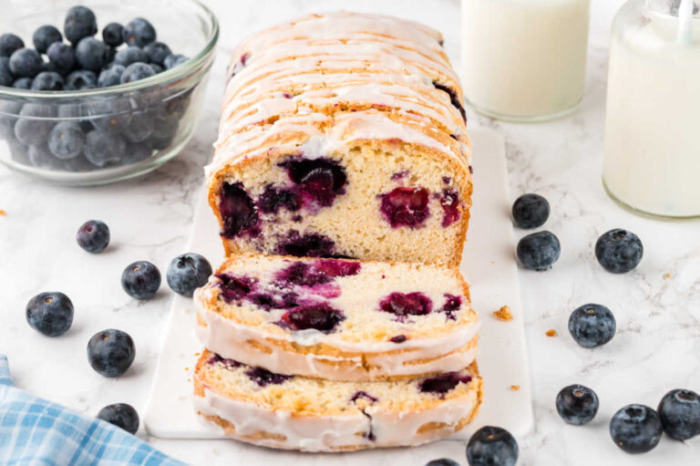 Blueberry bread with slices cut off the end.