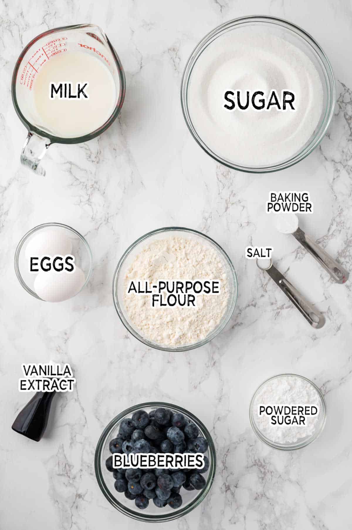 Ingredients on a white counter.