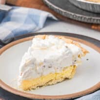 A slice of pie on a plate.
