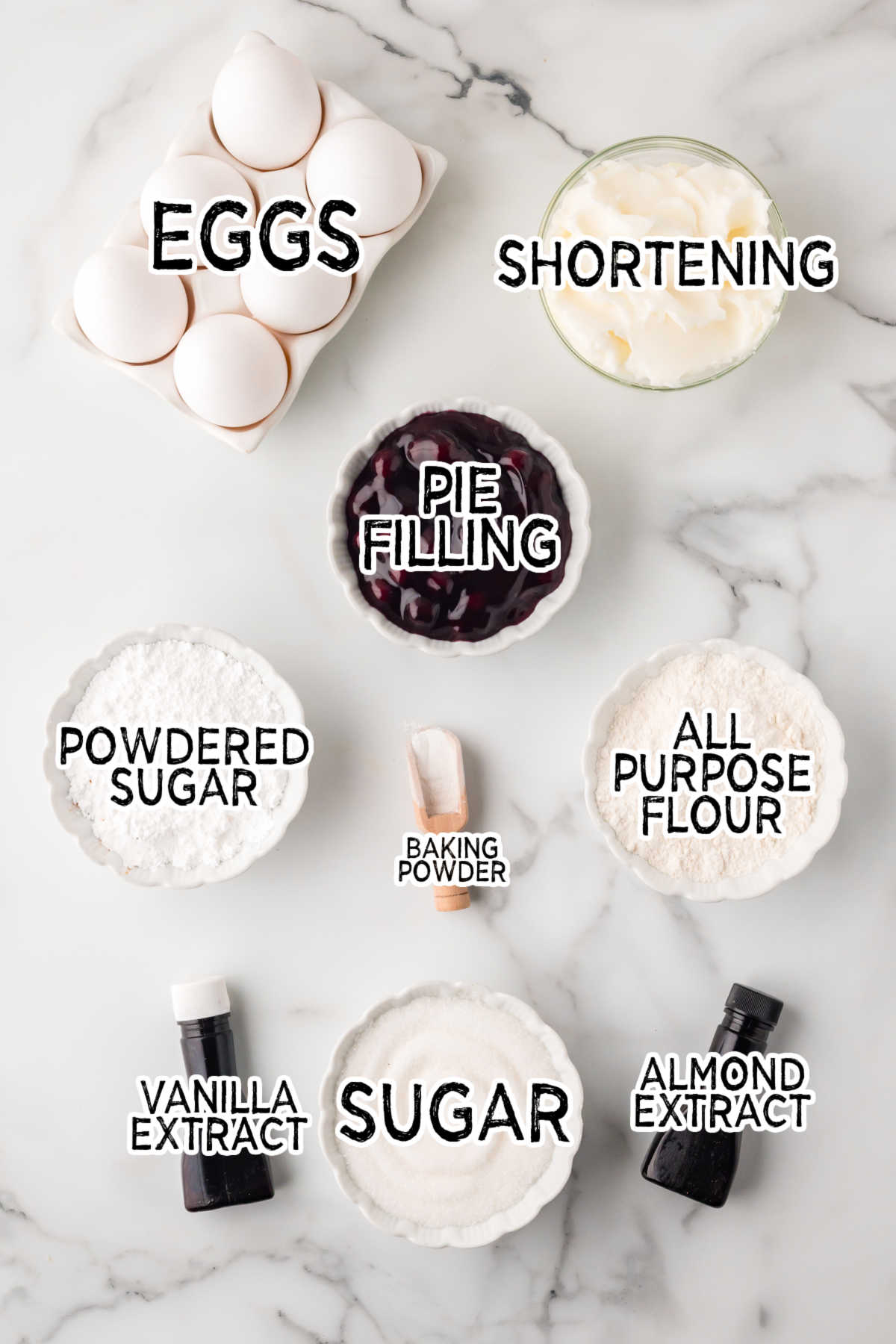 Ingredients on a white marble counter.