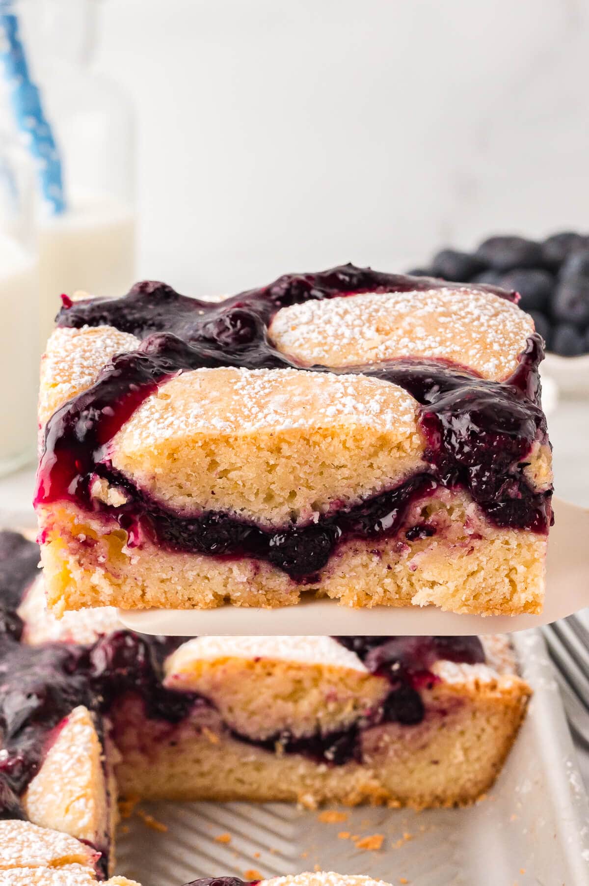 A slice of cake on a spatula.