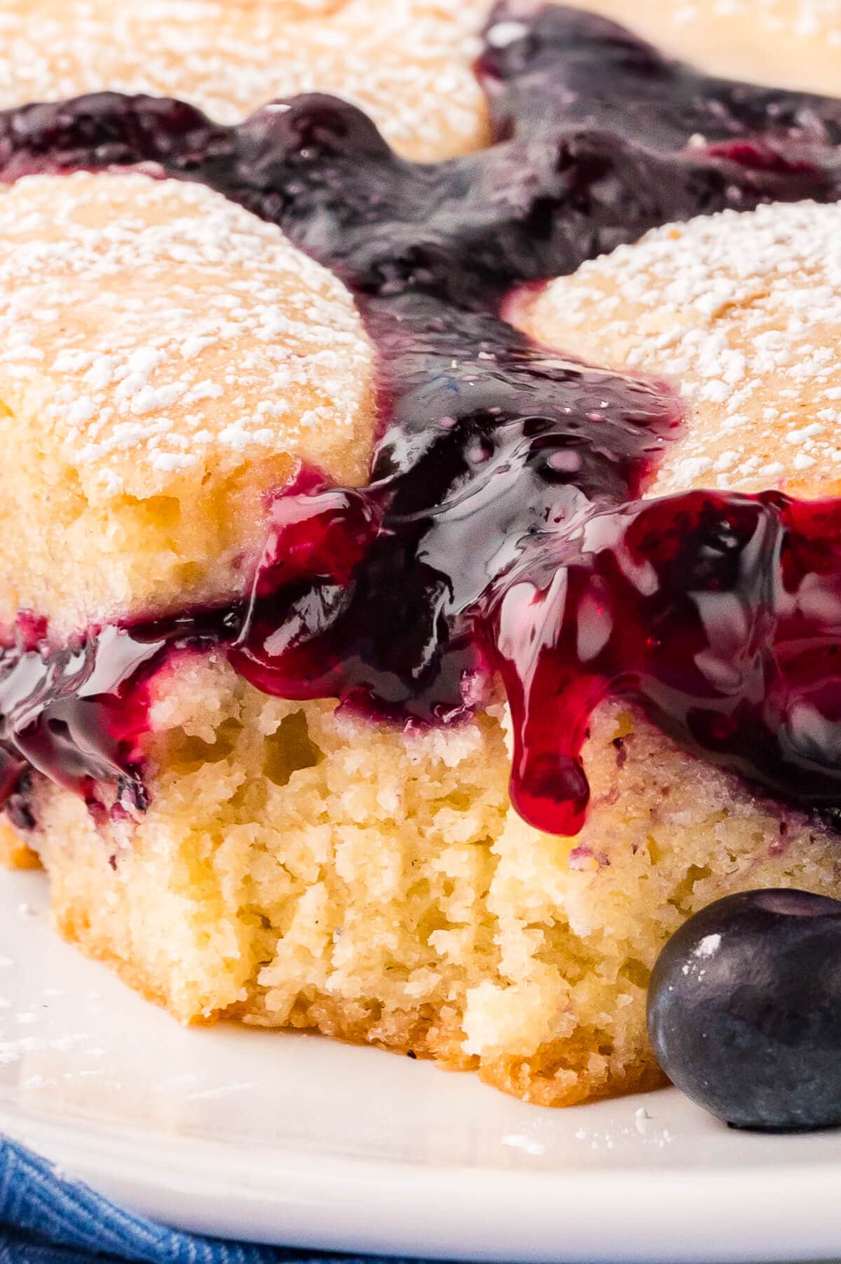 Close up of a piece of cake with a bite out of it.